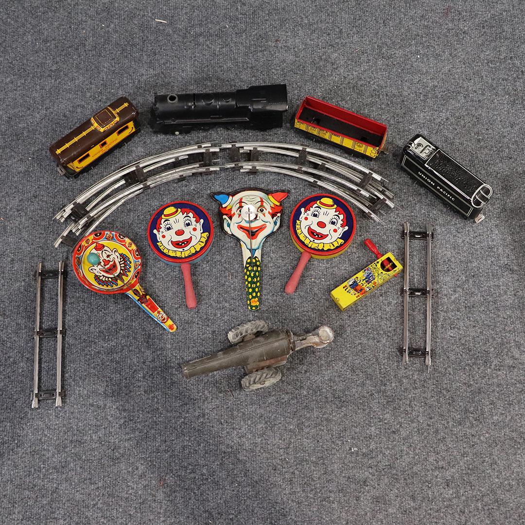 Group Vintage Toys: Tin Trains, Noise Makers, Cannon: Group Vintage Toys: Tin Trains, Noise Makers, Cannon. 10 total pieces of railroad track