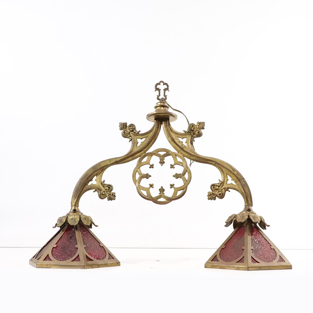 Antique American Gothic Double Light Bronze Chandelier: Antique American Gothic Double Light Bronze Chandelier, each side is a 6-panel red glass shade. All original, Original patina finish. size: 25 in. height x 32 in. length