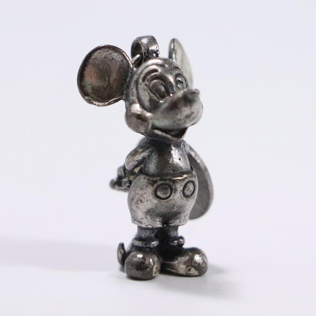 Sterling Silver Mickey Mouse Figure Pendant: Sterling Silver Mickey Mouse Figure Pendant. Size: 1 in. x 1/2 in.