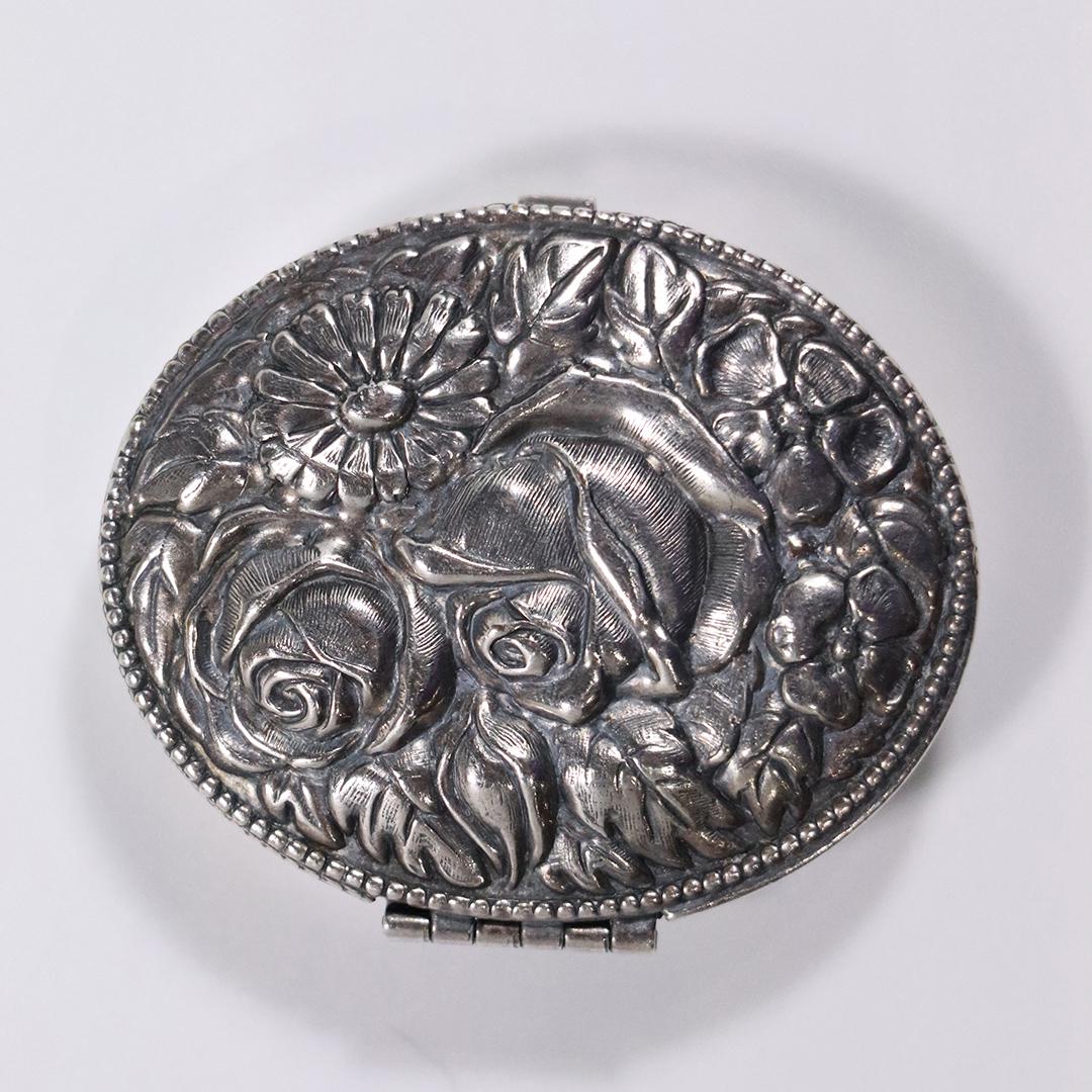Sterling Silver Oval Embossed Roses Trinket / Pill Box: Sterling Silver Oval Embossed Roses Trinket / Pill Box. Size: 2 in. x 1.75 in.