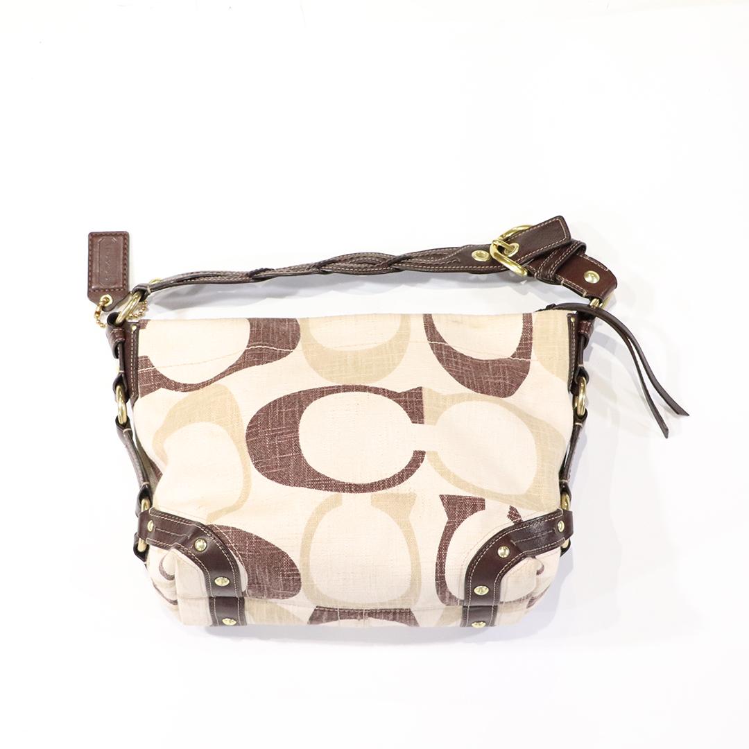 COACH - Carly Tonal Signature Hobo Handbag - Clean: COACH - Carly Tonal Signature Hobo Handbag - Clean. Good condition. Size: 8.5 in. x 12.5 in.