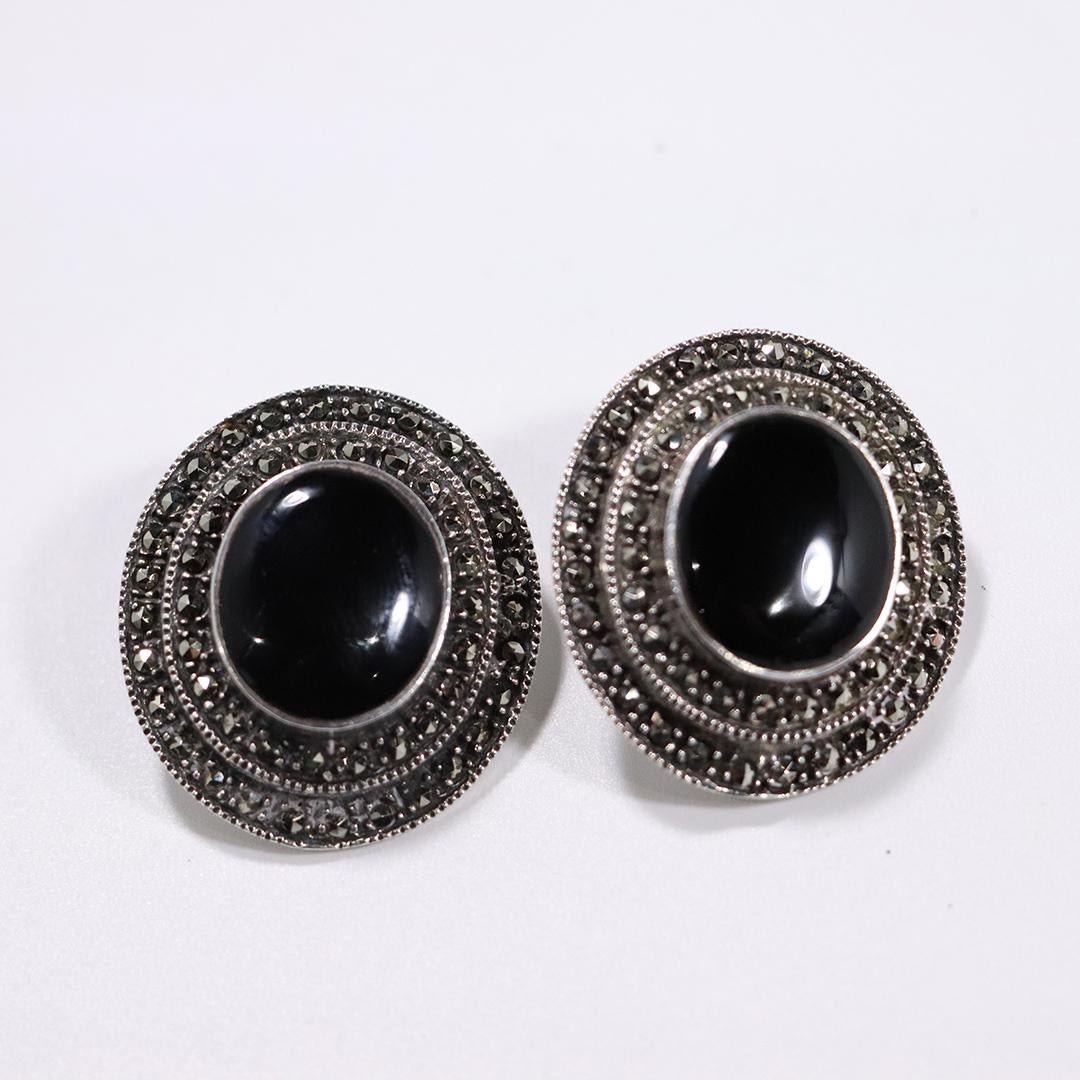 .925 Sterling Silver, Black Onyx, Marcasites Earrings: .925 Sterling Silver, Black Onyx, Marcasites Earrings. Size: 1.25 in. x 1 1/8 in.