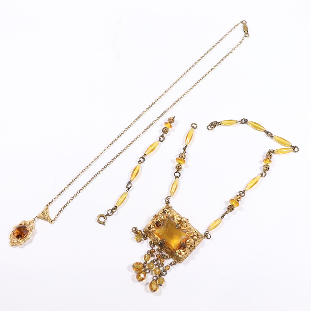 [2] Victorian Lavalier Costume Necklaces Czech, Amber: [2] Victorian Lavalier Costume Necklaces. Made in Czechoslovakia with Amber beads Size: 15 in. x 2.5 in.; Lavalier with Amber stone Size: 17 in. x 1.5 in.