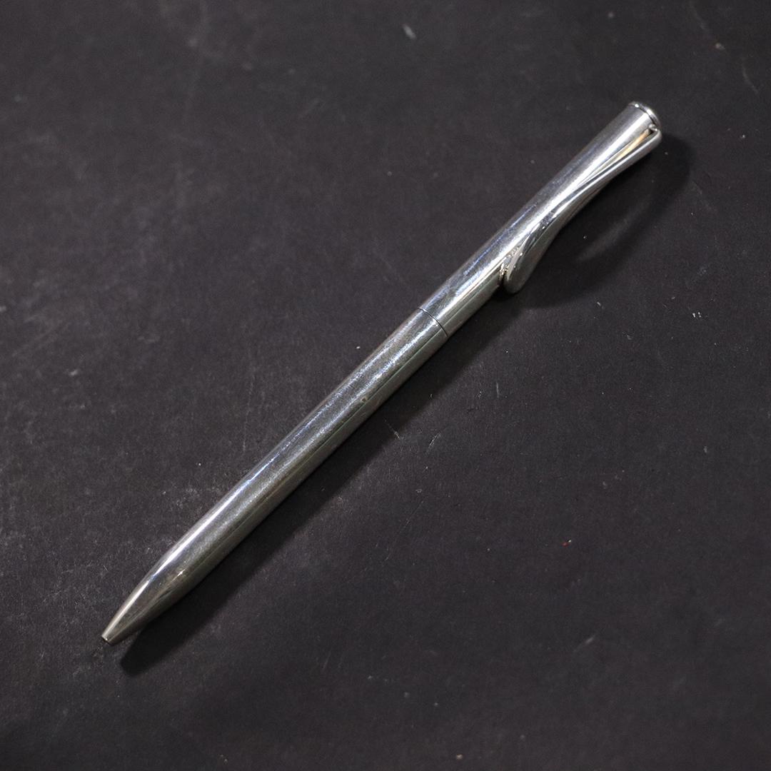 Tiffany and Co. Sterling Silver Writing Pen with Box: Tiffany and Co. Sterling Silver Writing Pen with Box and fabric pouch. size: 5.25L x 0.5w