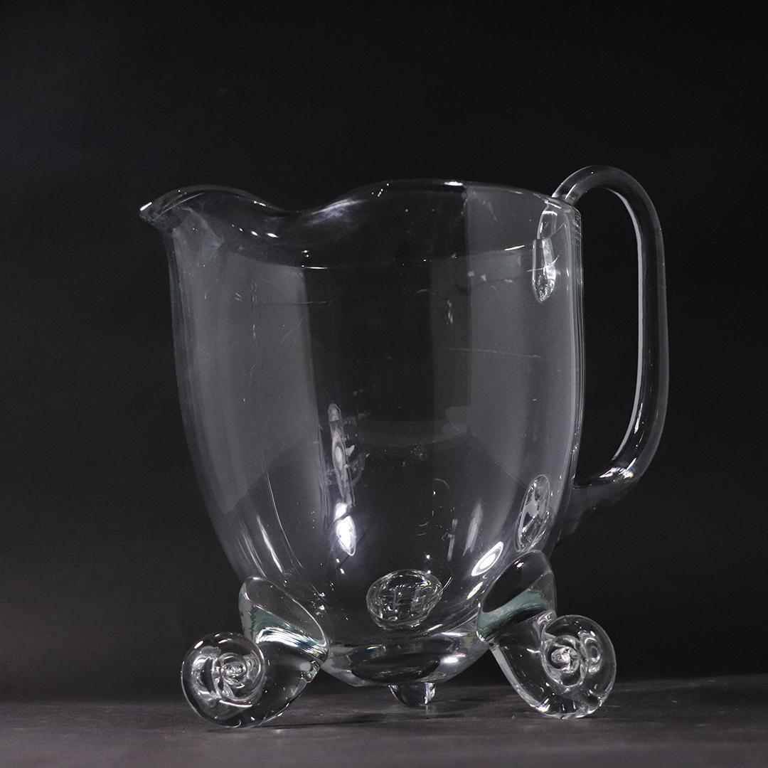 Hand Blown Crystal Glass Water Pitcher Curled Foot Base: Hand Blown Crystal Glass Water Pitcher Curled Foot Base. Polished pontil. High Quality glass. size: 10h x 10.5w