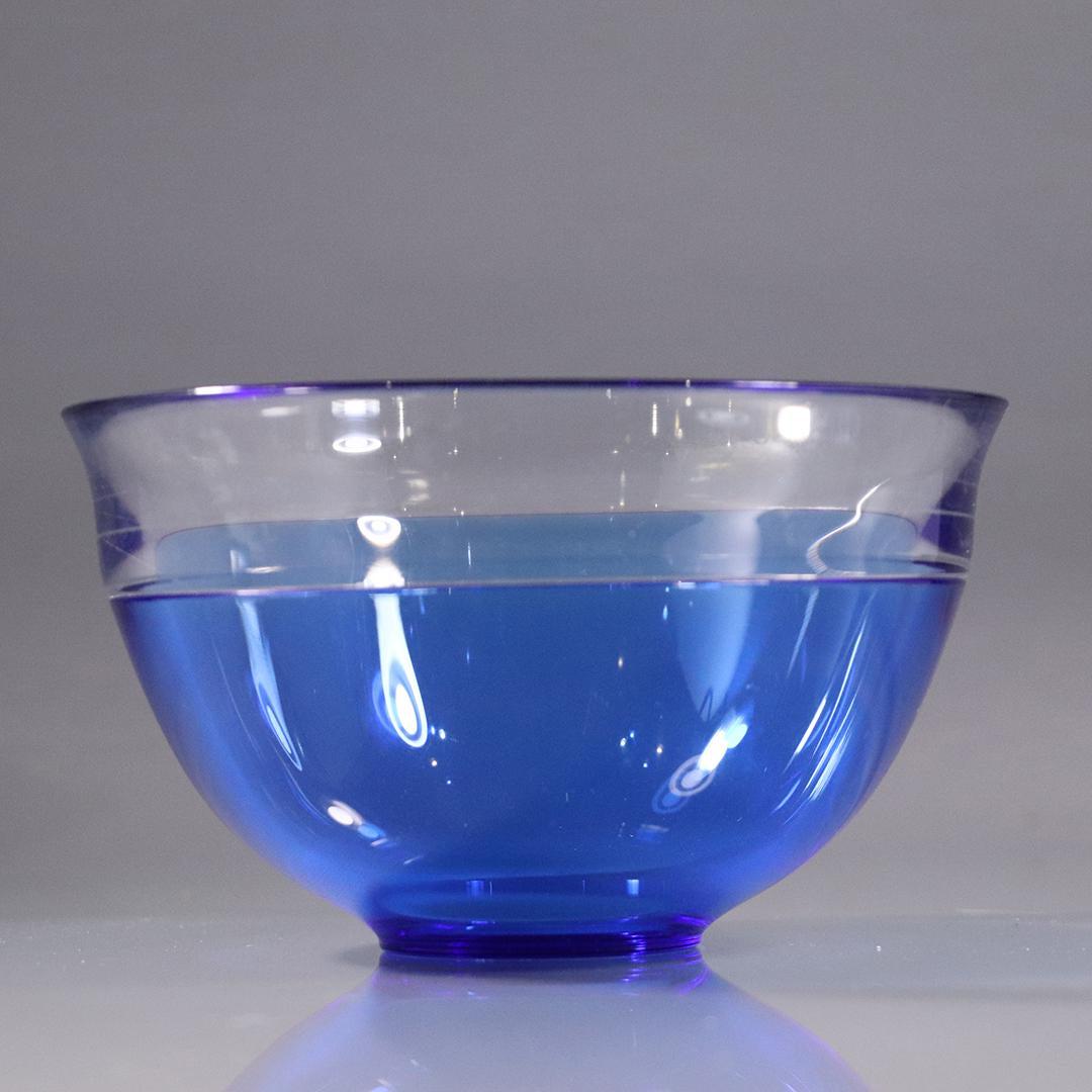 Orrefors Signed Blue Glass Bowl with Clear Rim: Orrefors Signed Blue Glass Bowl with Clear Rim. Size: 4 in. height x 7 in. diameter