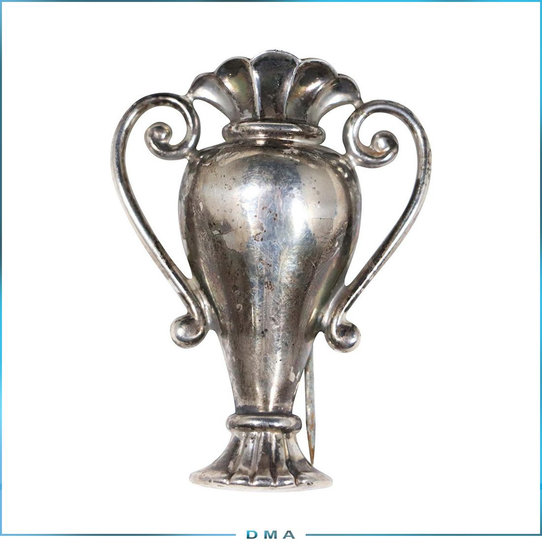 MONET Sterling Silver Urn Brooch: MONET Sterling Silver Urn Brooch. Marked: Monet. size: 2 in. x 1.5 in.