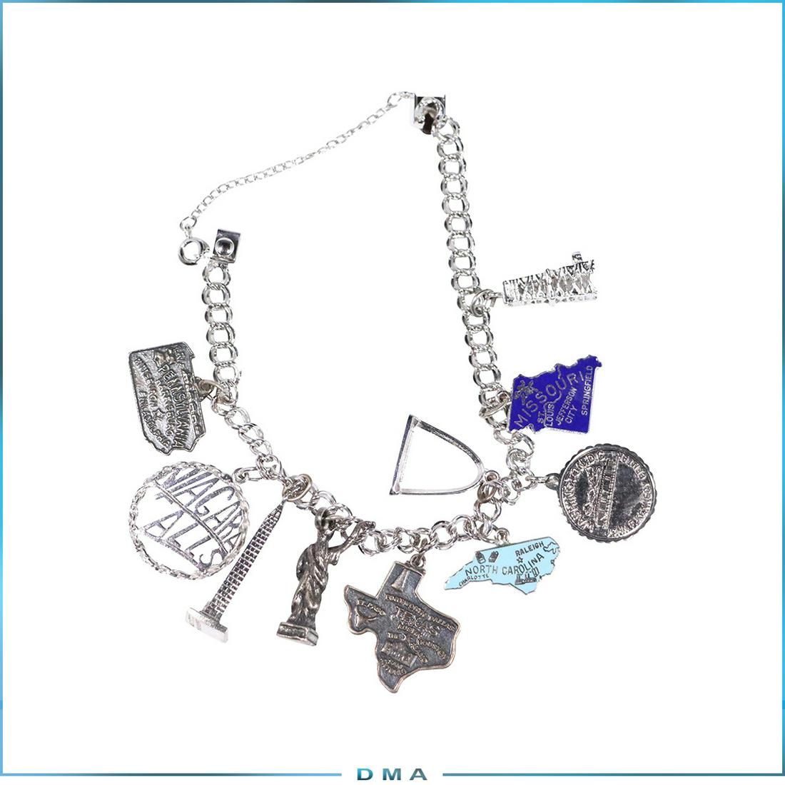 Sterling Silver Charm Bracelet with 10 Sterling Charms: Sterling Silver Charm Bracelet with 10 Sterling Charms. size: 7 in. length