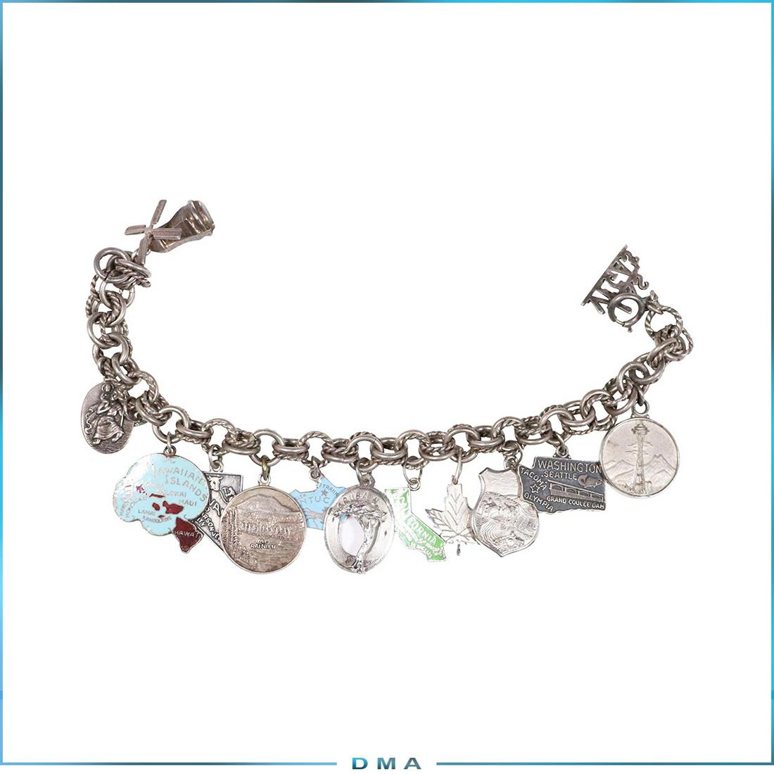 .800 Silver Charm Bracelet with 13 Charms, 9 Sterling: .800 Silver Charm Bracelet with 13 Charms, 9 are Sterling Silver, other 3 are marked: [1] Silver TM & Co.; [1] marked Silver ; other not marked. size: 8.5 in. length