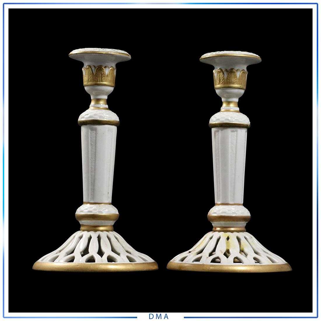 Pair Capodimonte White & Gold Porcelain Candlesticks: Pair Capodimonte White & Gold Porcelain Candlesticks. Marked on base bottom. size: 7.5 in. h x 4.25 in. w