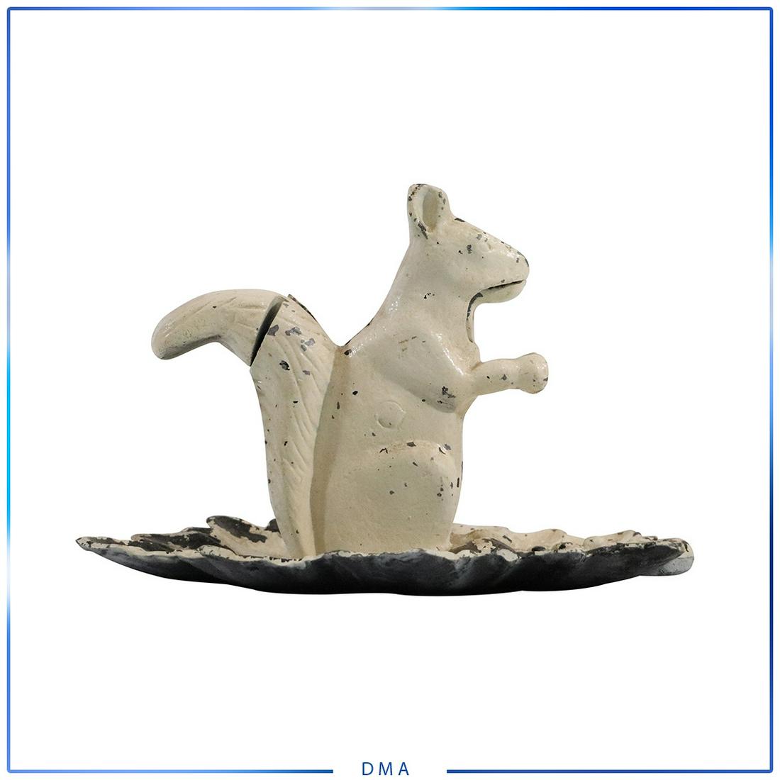 Cast Iron Squirrel on Leaf Nut Cracker: Cast Iron Squirrel on Leaf Nut Cracker. size: 8h x 12l x 9.75w