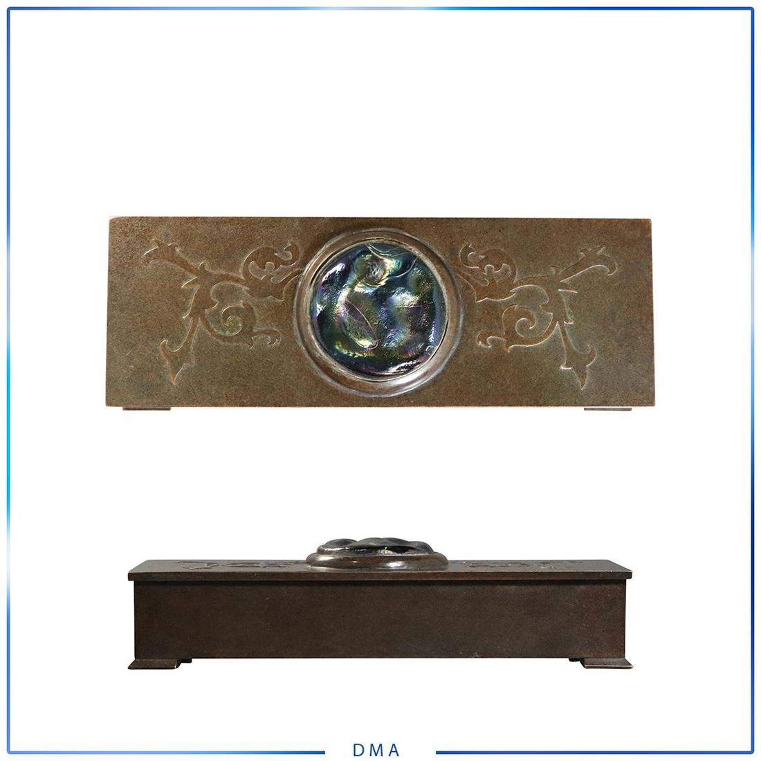 TIFFANY STUDIOS NEW YORK #1071 Bronze Box w/ Art Glass: TIFFANY STUDIOS NEW YORK #1071 Bronze Box w/ Art Glass jewel on top cover. Personalized Christmas etched. Clara Driscoll and The Tiffany Girls. Good bronze patina finish. size: 2h x 10l x 3.5w