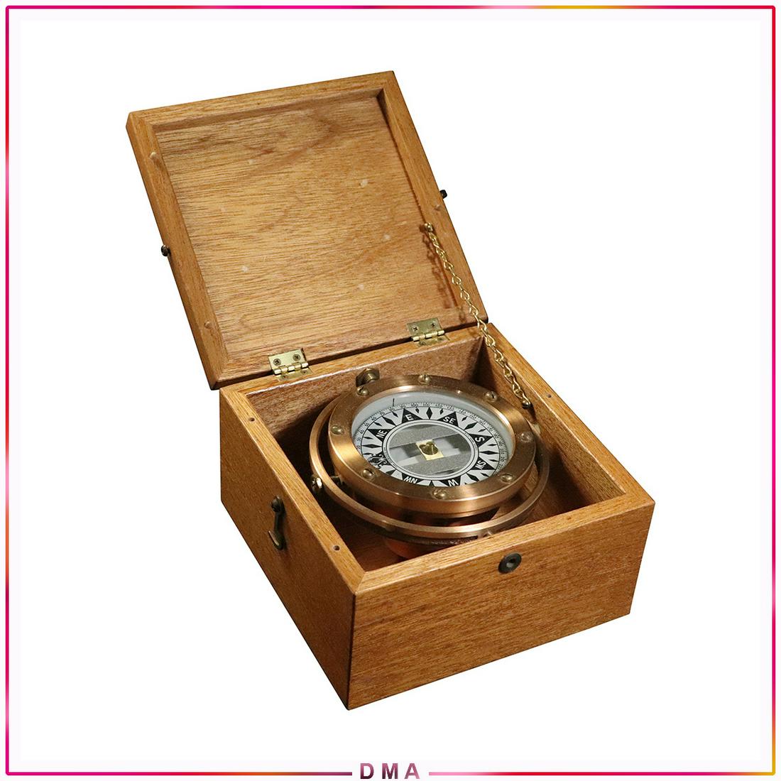 Nautical Brass Compass in Wood Travel Box: Nautical Brass Compass in Wood Travel Box. Size: 3.75h x 6.5L x 6.5w