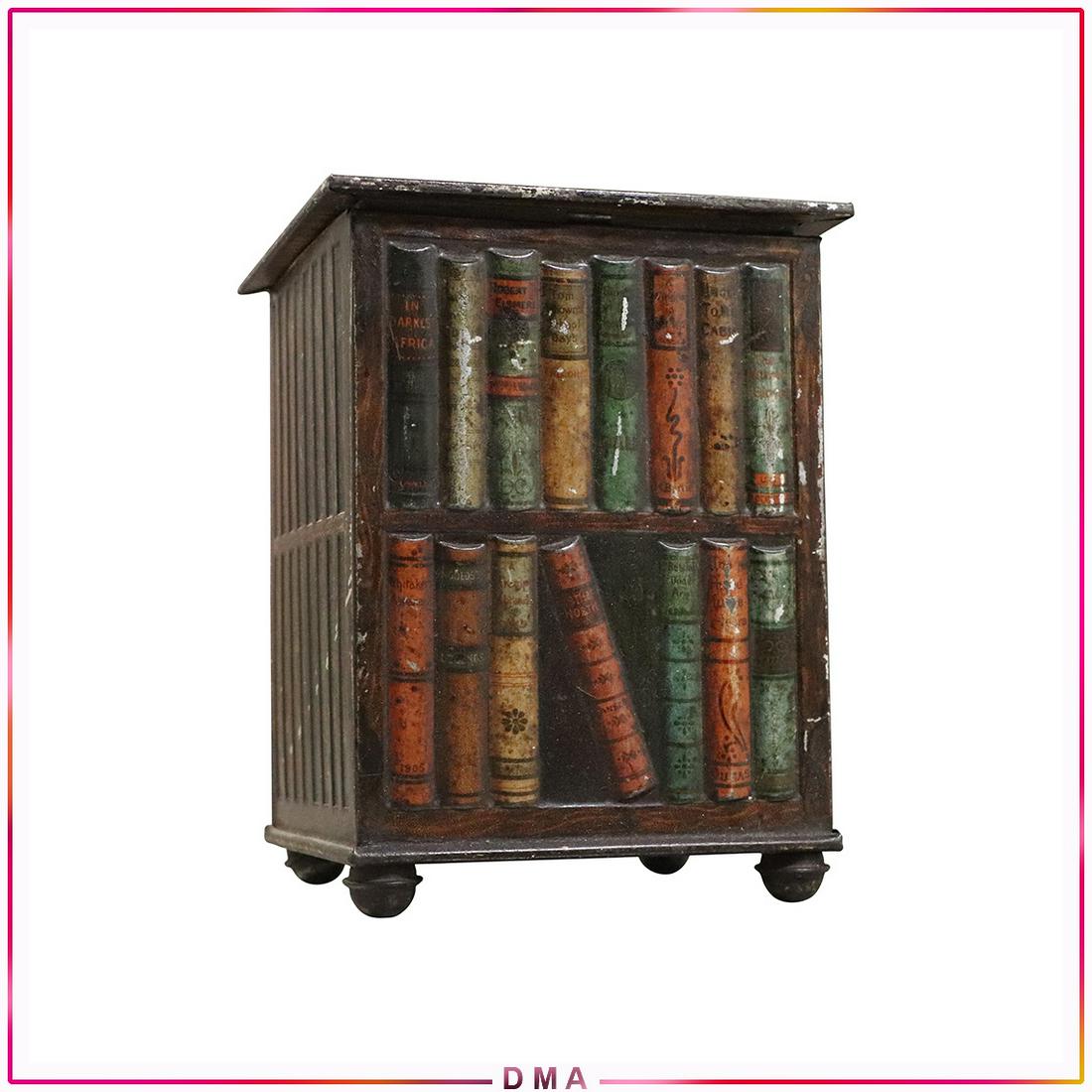 Huntley & Palmer English Biscuit Tin Shape of Bookcase: Huntley & Palmer English biscuit tin in the form of a bookcase of books, signed on interior of hinged lid: "Huntley & Palmers Biscuits Reading & London". Size: 6.5h x 5w x 4.25d