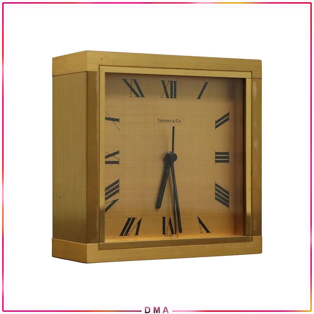 TIFFANY & CO #2254 Brass Desk Top Clock: TIFFANY & CO #2254 Brass Desk Top Clock. Battery operated, I just put in a new battery and it works fine. Size: 4x4x1.5
