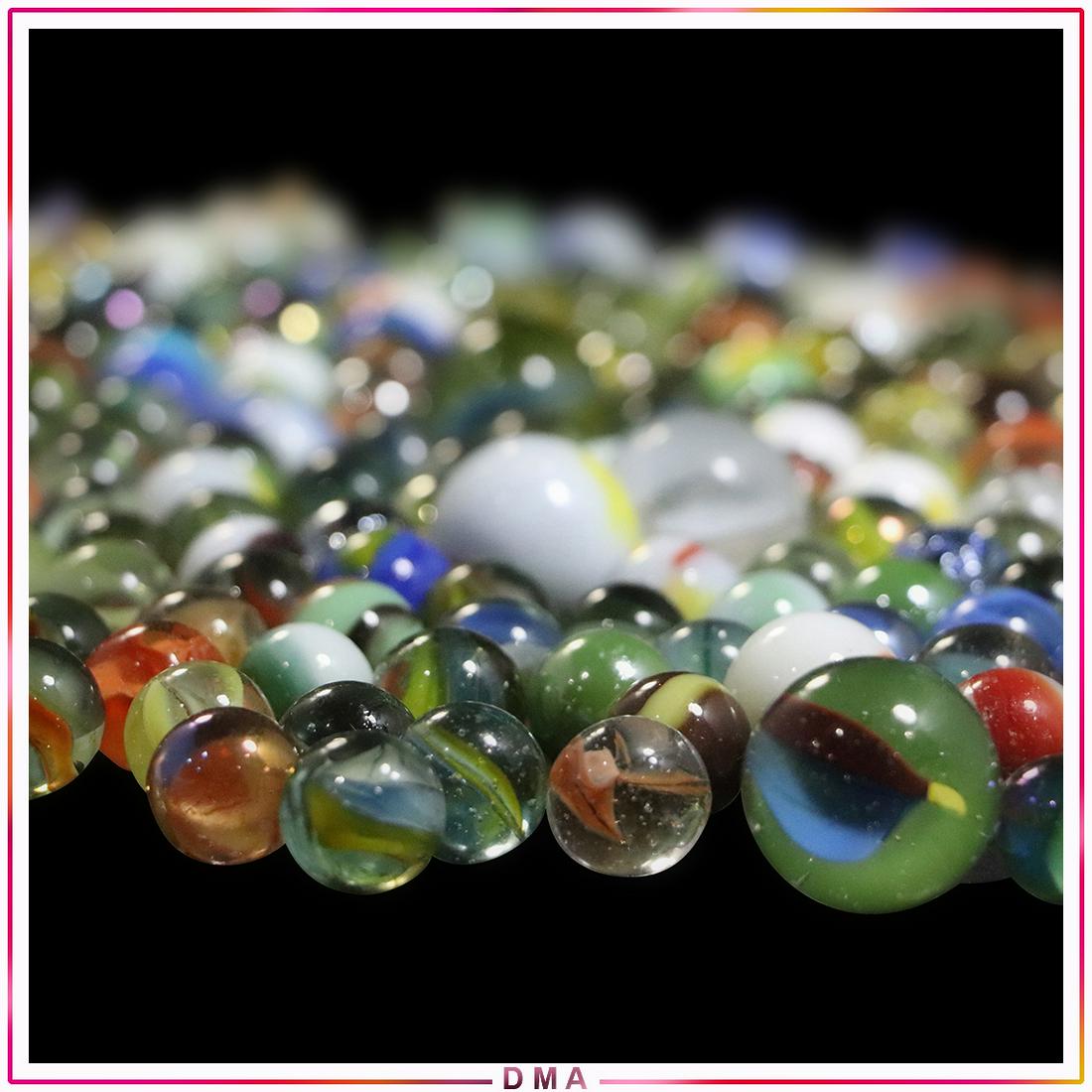 Collection of Over 100 Vintage Marbles: Collection of Over 100 Vintage Marbles. Size: 2.5x7.5 bin