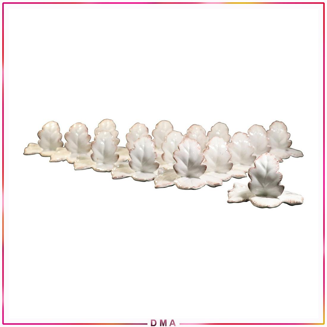 [16] Sixteen Mikasa Ceramic Leaf Napkin Rings: [16] Sixteen Mikasa Ceramic Leaf Napkin Rings. Size: 3x4x4