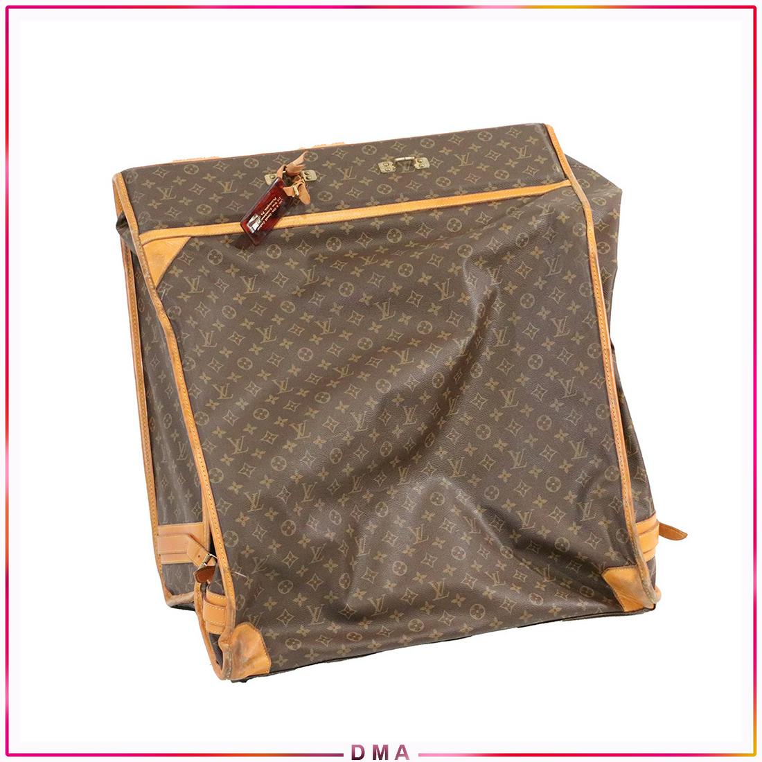 Louis Vuitton Fold-Over Garment Suitcase - Vintage: Louis Vuitton Fold-Over Garment Suitcase - Vintage. Classic Monogram pattern. Clean. Authenticity uncertain. Size: 24x26x14 closed, 24x52x6 closed