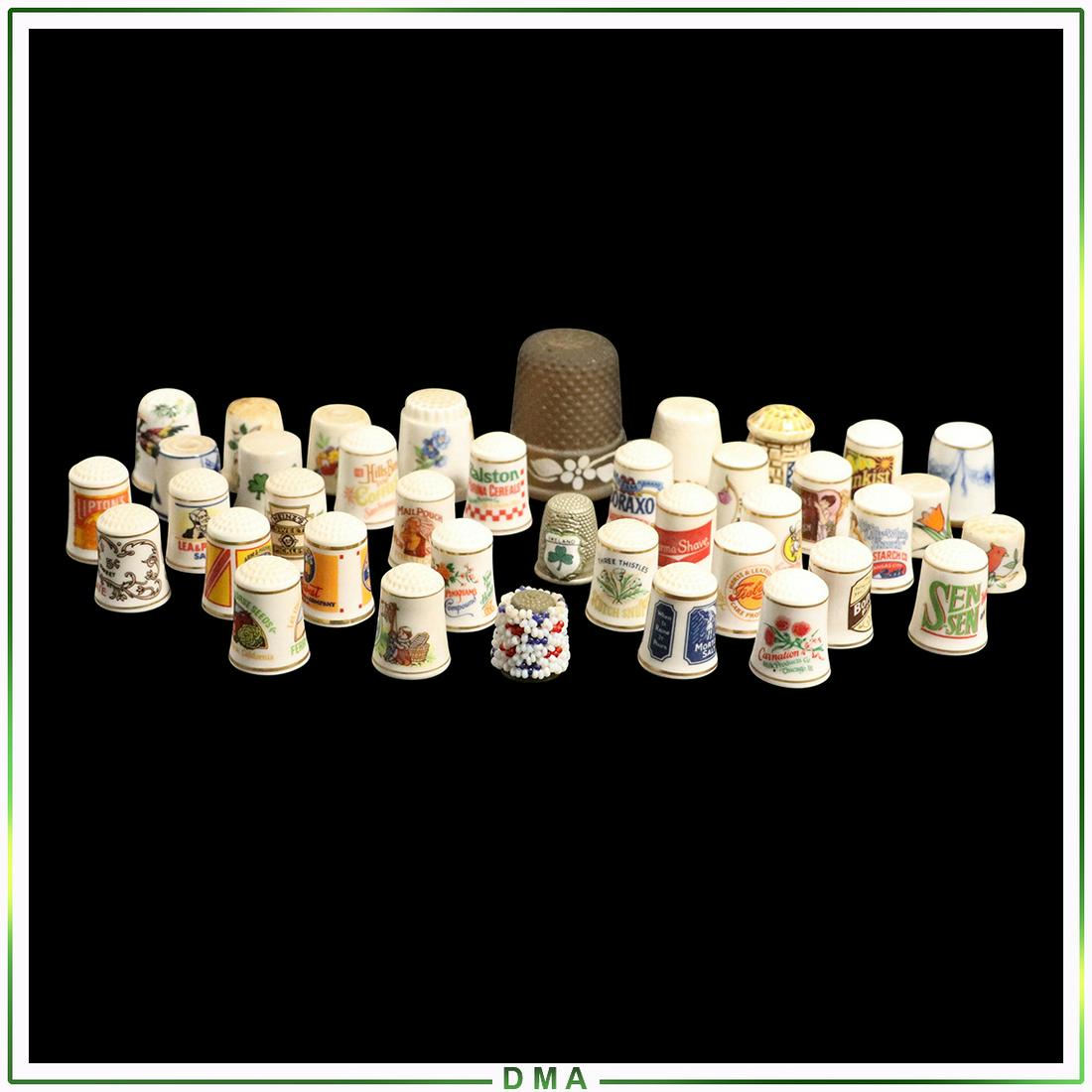 Group Lot of Vintage Porcelain Thimbles: Group Lot of Vintage Porcelain Thimbles. Mostly advertising. Size: 0.75-1.75h range