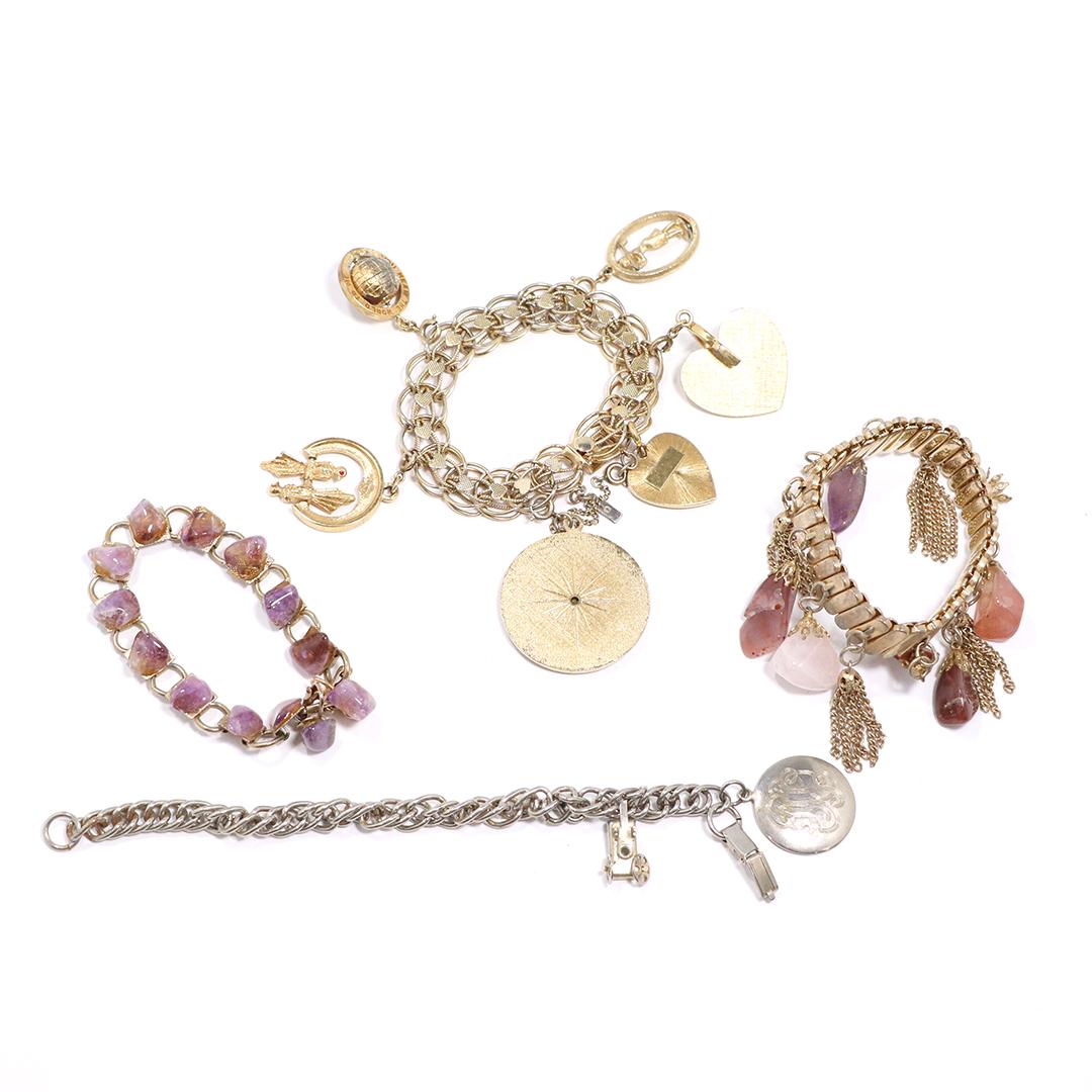 [4] Four Assorted Costume Fashion Charm Bracelets: [4] Four Assorted Costume Fashion Charm Bracelets. size: range from 2 1/2 in. x 3/4 in. to 2 1/2 in. x 1/8 in.