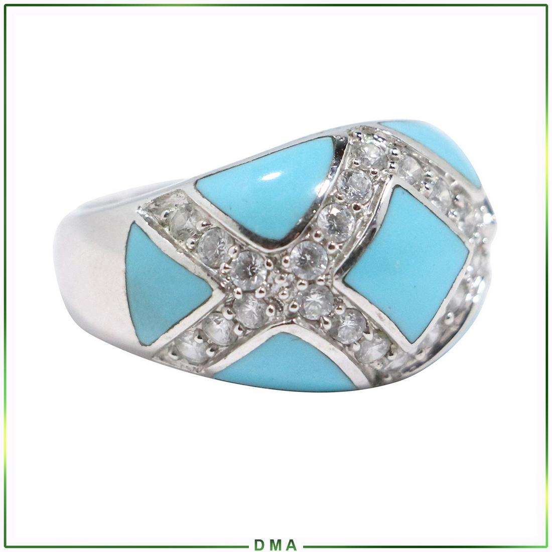 .925 Sterling Silver Turquoise and CZs Ring Size 7: .925 Sterling Silver Turquoise and CZs Ring Size 7. Marked: .925 EG ; size 7/8 in. x 5/8 in.