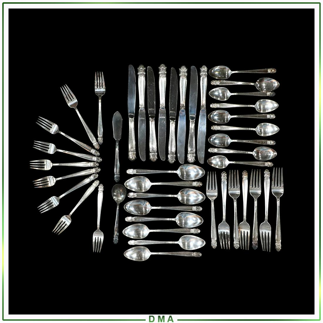 43 Pc. Holmes & Edwards Inlaid Silver Plate Flatware: 43 Pc. Holmes & Edwards Inlaid Silver Plate Flatware in Box. Please look at pictures to get count on individual pieces. Size: 6-9.25L range