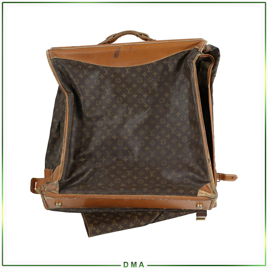 Louis Vuitton Fold-Over Garment Suitcase - Vintage: Louis Vuitton Fold-Over Garment Suitcase - Vintage. A few spots need restoration See Pic. Classic Monogram Pattern. Size: 51L x 24w unfolded