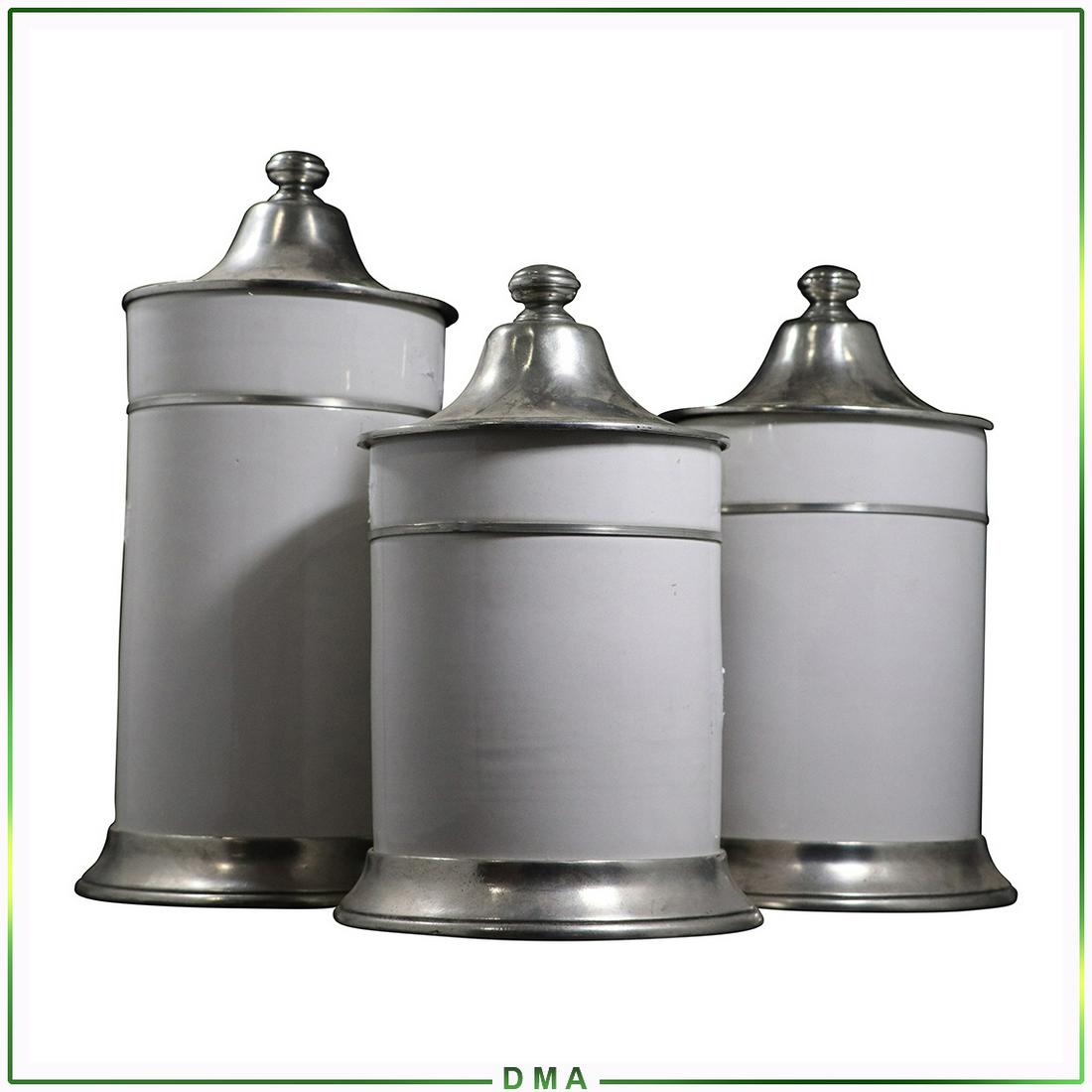 Arte Italica 3-Piece Canister Set White Porcelain: Arte Italica 3-Piece Canister Set White Porcelain in graduated sizes, pewter base mounts and pewter top covers. Size: 7w x 10-13h range