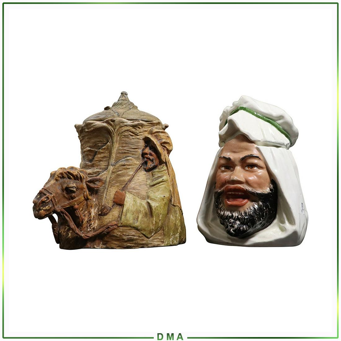 2 Antique Austrian Ceramic Arabian Tobacco Jars, Camel: 2 Antique Austrian Ceramic Arabian Tobacco Jars, Camel and Arab men. Size: 6h x 4.5w, 6h x 7.5w