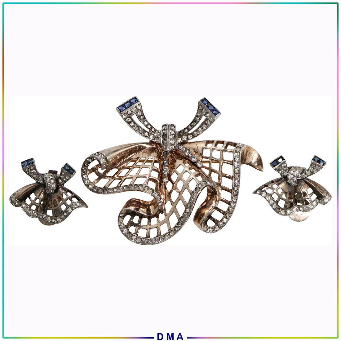 3 Pc. Mazer Sterling with Blue & Clear Rhinestones Set: 3 Pc. Mazer Sterling with Blue & Clear Rhinestones Brooch and Earrings Set. Marked Mazer Sterling. Size: brooch 2 3/4 in. x 2 1/2 in. ; Clip Earrings 1 1/4 in. x 1 in.