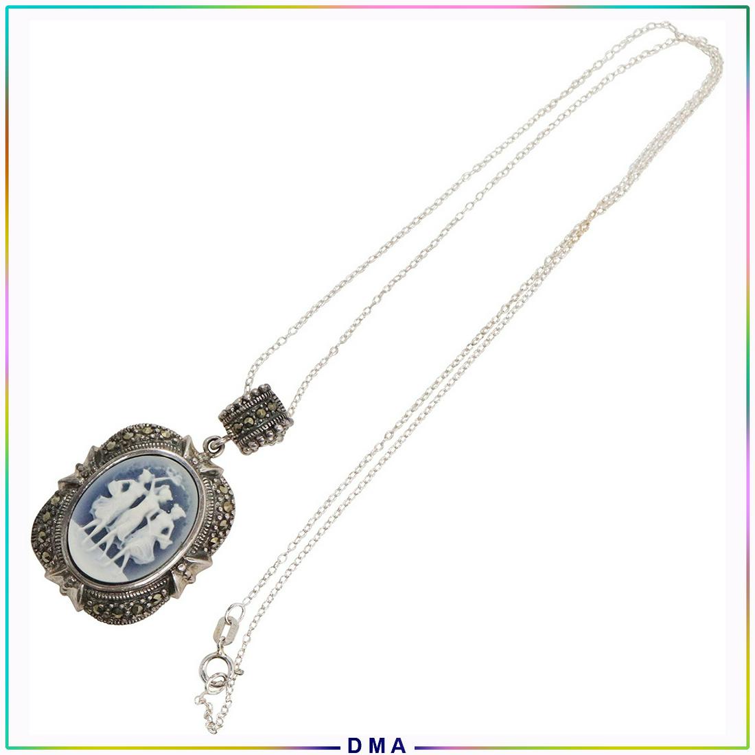 .925 Sterling Blue Cameo Marcasites Pendant Necklace: .925 Sterling Silver Blue Cameo Marcasites Pendant Necklace. Both pendant and chain marked: .925 ; Size: pendant 1 3/4 in. x 1 in. ; chain 18 in. length.