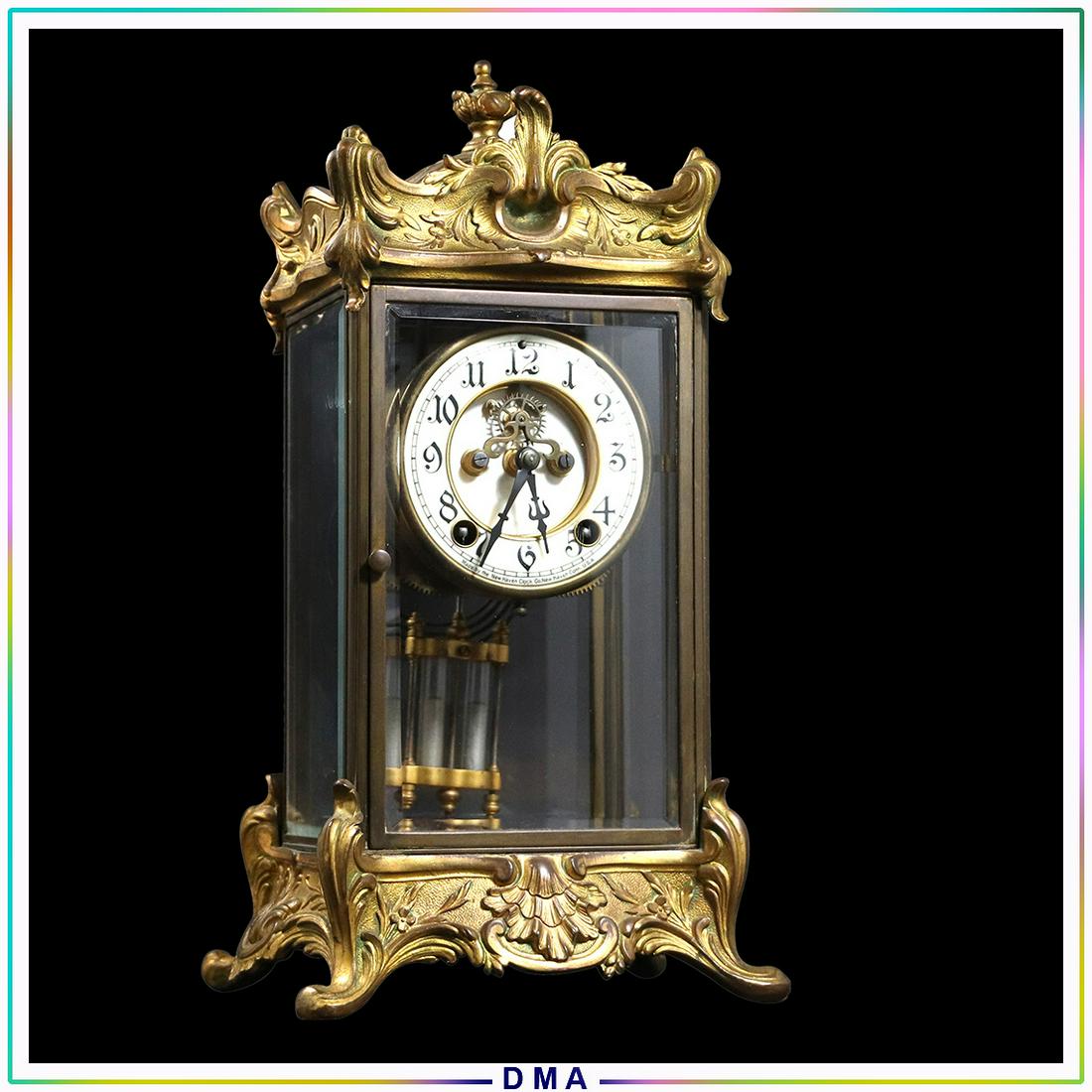 New Haven Clock Co Fancy Crystal Regulator Mantle Clock: New Haven Clock Co Fancy Crystal Regulator Mantle Clock. Original key and pendulum. Dial marked: New Haven Clock Co., New Haven Conn. Brass case with bevel glass panels. Original patina finish. p> Siz
