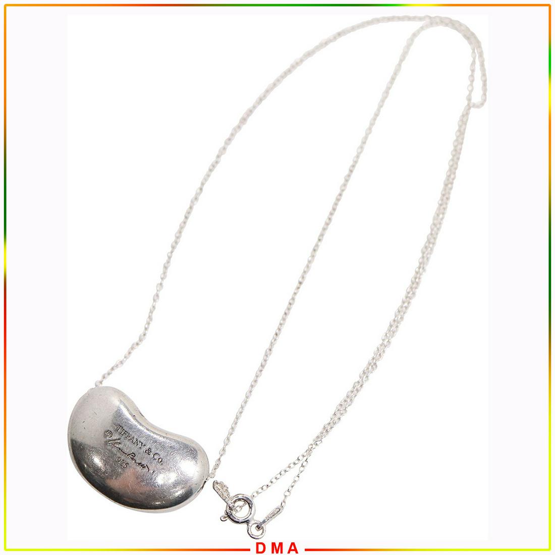 Tiffany & Co .925 Sterling Bean Pendant Elsa Peretti: Tiffany & Co .925 Sterling Bean Pendant Elsa Peretti on a .925 Sterling Italy Chain [chain not Tiffany]. Both Marked: .925 ; Size Tiffany Pendant 1 in. x 5/8 in. ; Chain 18 in. length.