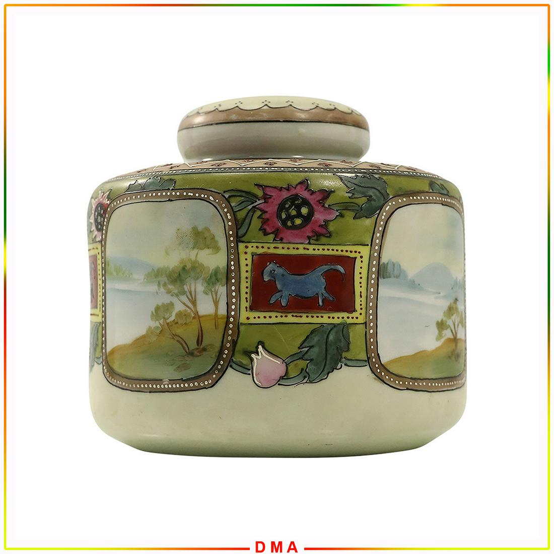 NIPPON Tobacco Jar, Hand Painted Landscape Panels: NIPPON Tobacco Jar, Hand Painted Landscape Panels and accent decoration. Does have a chip on lid rim. See Picture. Size: 5h x 6w