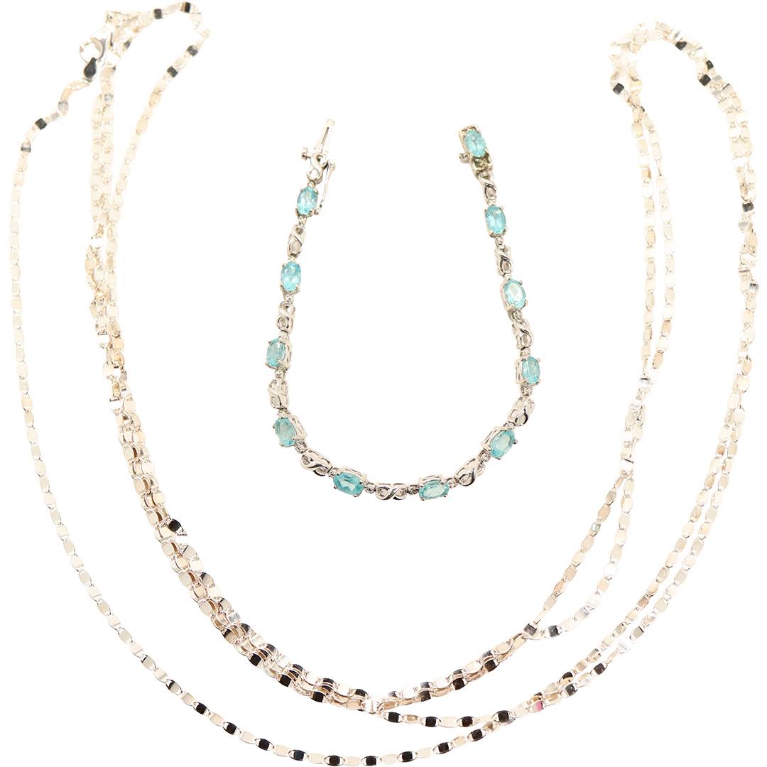 .925 Sterling Blue Topaz Tennis Bracelet & .950 Chain: .925 Sterling Blue Topaz Tennis Bracelet, marked .925, 7 1/2 in. x 1/4 in. & .950 Milor Italy Sterling Silver Long Dress Chain 60 inches x 1/8 in.