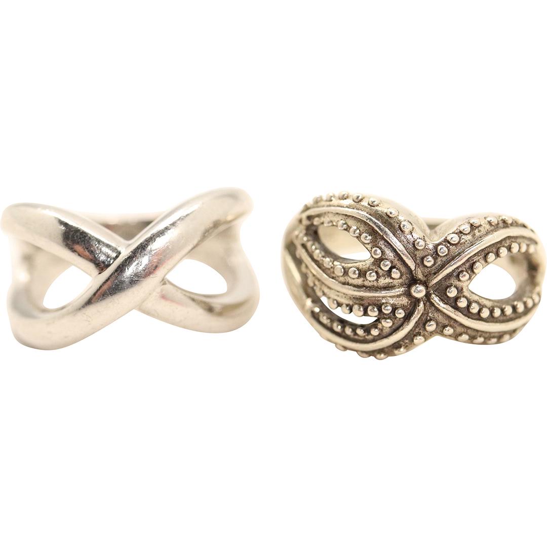 [2] .925 Sterling Silver Band Rings Both Size 7: [2] .925 Sterling Silver Band Rings Both Size 7, both marked .925. , One is a Beaded Bow, other is a Cross Band. size: 7/8 in. x 1/2 in.