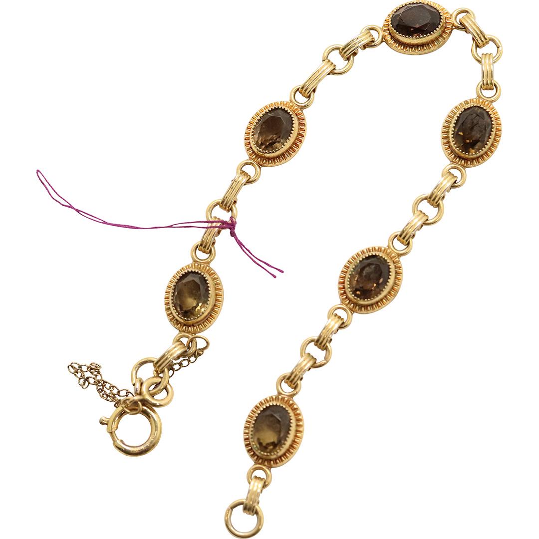 12K GF Smokey Topaz Tennis Bracelet: 12K GF Smokey Topaz Tennis Bracelet. Size: 8 1/2 in. x 3/8 in.