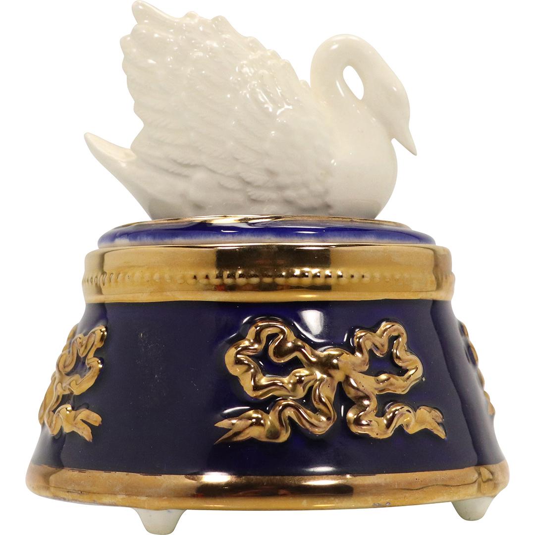 Teleflora White Swan on Cobalt Base Music Box: Teleflora White Swan on Cobalt Base Music Box. Size: 6h x 5.75w