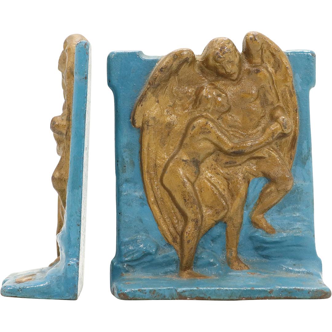 Vintage Cast Iron Embracing Angels Bookends: Vintage Cast Iron Embracing Angels Bookends in old paint finish. Size: 6.25h x 5w