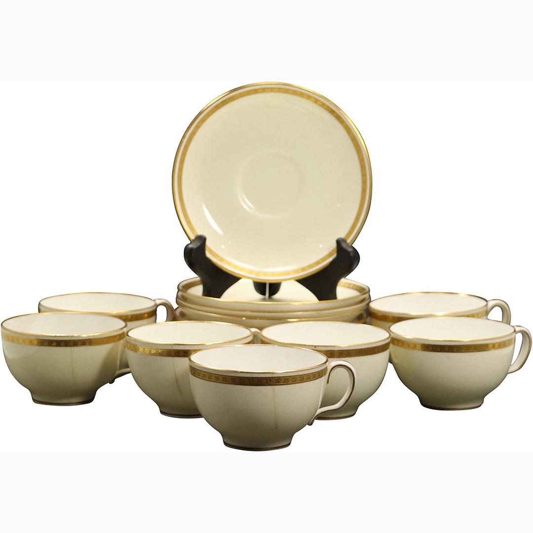 17 Pcs MINTON Tiffany & Co New York Cups & Saucers: 17 Pcs MINTON Tiffany & Co New York Cups & Saucers. gold rim cups(7) and saucers(10), 3 fractured cups, Size: 2.25h x 4.25w cups, 5.75dia saucers