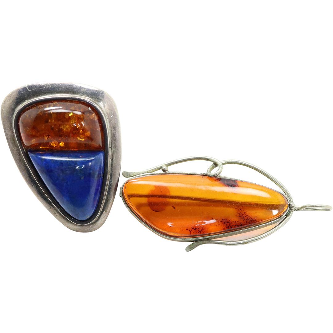 .925 Sterling Amber Brooch & Sterling Amber Lapis Ring: .925 Sterling Amber Brooch & Sterling Amber Lapis Ring. Marked: .925 ; Size Brooch 2 1/4 in. x 7/8 in. ; Ring Sizer: ; size 1 1/8 in. x 5/8 in.