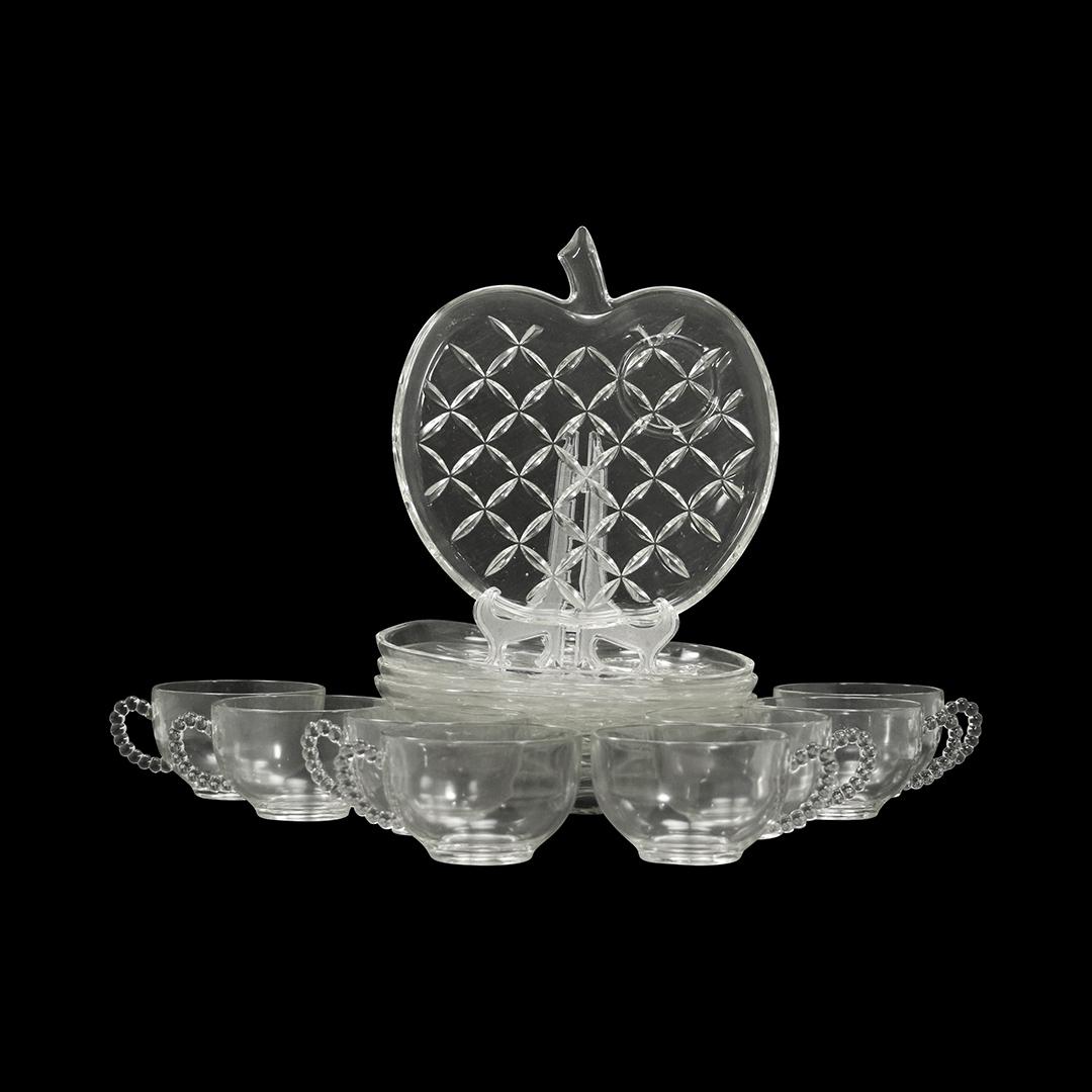 "Apple" Tea and Toast Set in Original Box - Clear Glass: "Apple" Tea and Toast Set in Original Box - Clear Glass. Size: (8x) 8.5L x 8w plates, (8x) 2.25h x 4.25w mugs