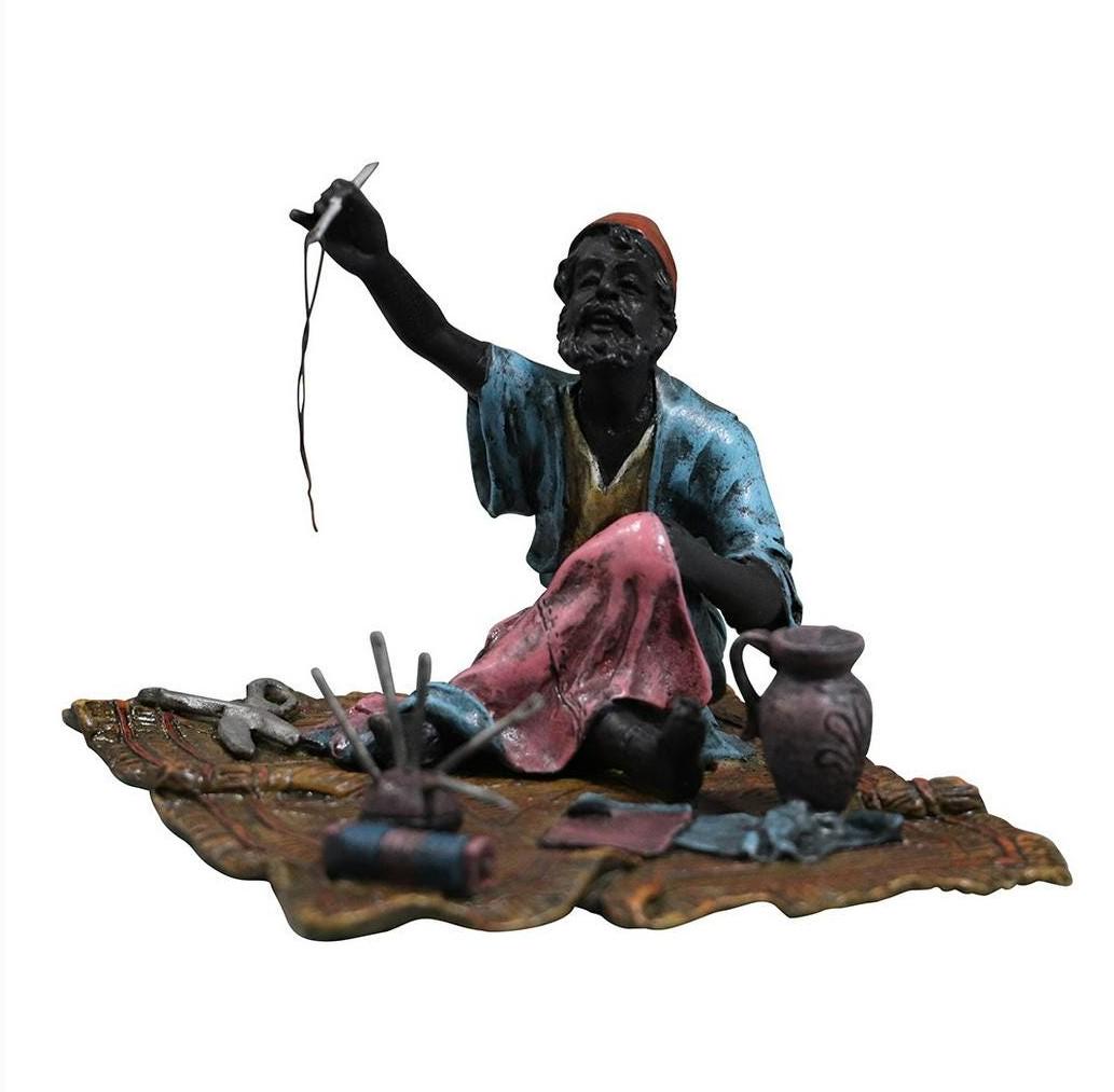 after Bergman, Vienna Bronze Arab Seamstress Tailor: after Bergman, Vienna Bronze Arab Seamstress Tailor. Bears signature. Original bronze patina finish. Size: 3.5h x 4.75L x 4.25w