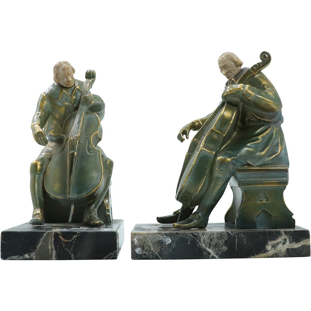 C. 1932 Pair Cast Metal Cellist Musician Bookends (1 of 8)