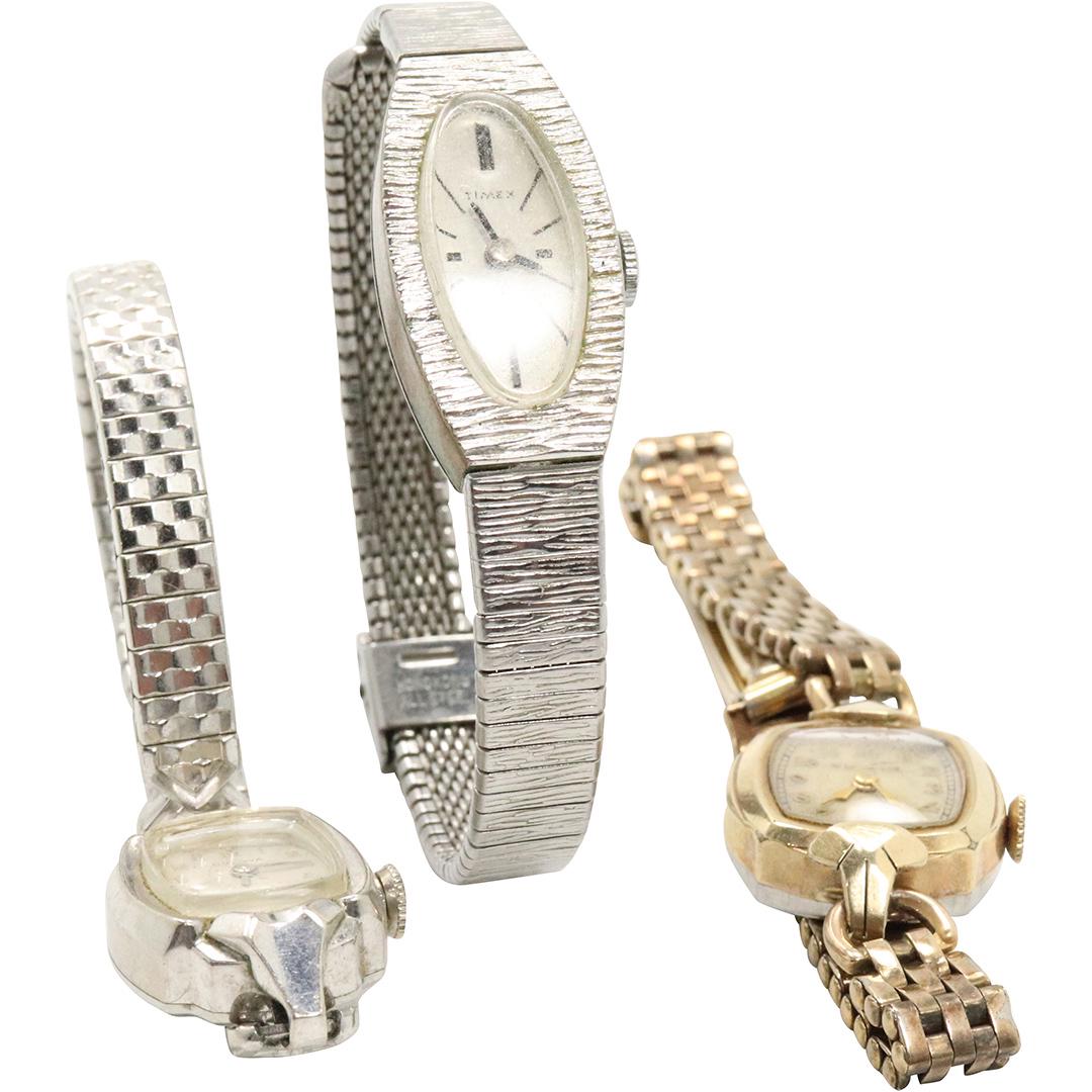 3 Wristwatches Bulova 10K GF; Bulova 10K RPG, Timex Chr: 3 Ladies Wristwatches Bulova 10K GF [marked Kreisler 25 Gold Content Band]; Bulova 10K RPG, Timex Chrome plate.