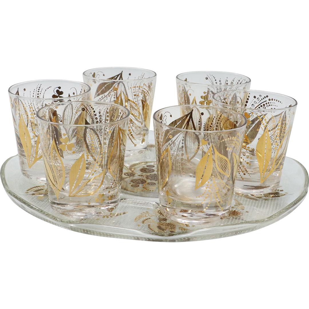 6 Gold Decorated Glasses on Georges Briard Platter: 6 Gold Decorated Glasses on Georges Briard Platter also gold decorated pattern. Size: 3.25h x 3w glasses. 11.5w tray