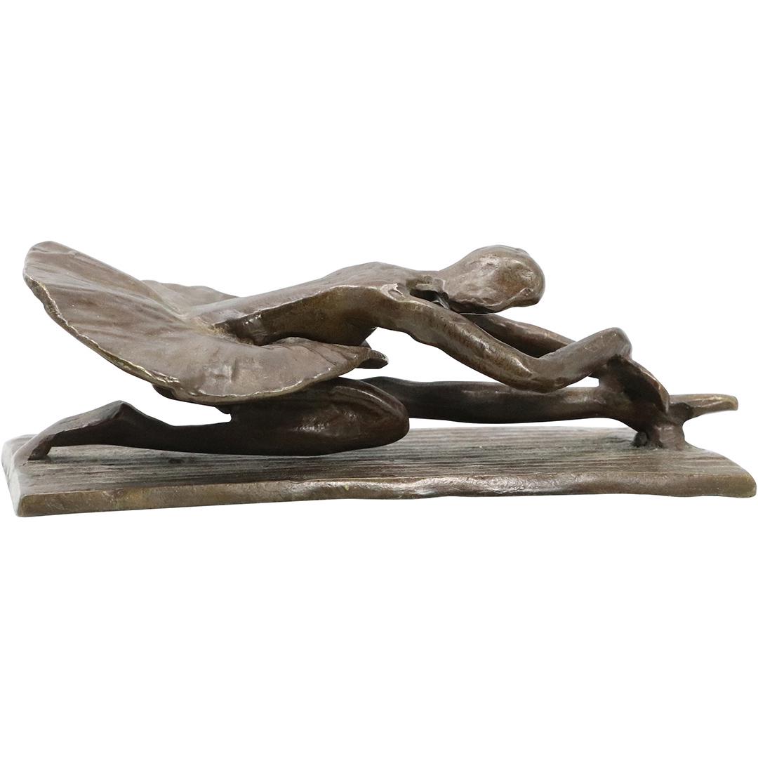 after Degas, Bronze Stretching Ballerina Sculpture: after Degas, Bronze Stretching Ballerina Sculpture . Good bronze patina. Unsigned. Size: 2.75h x 9L x 4.5w