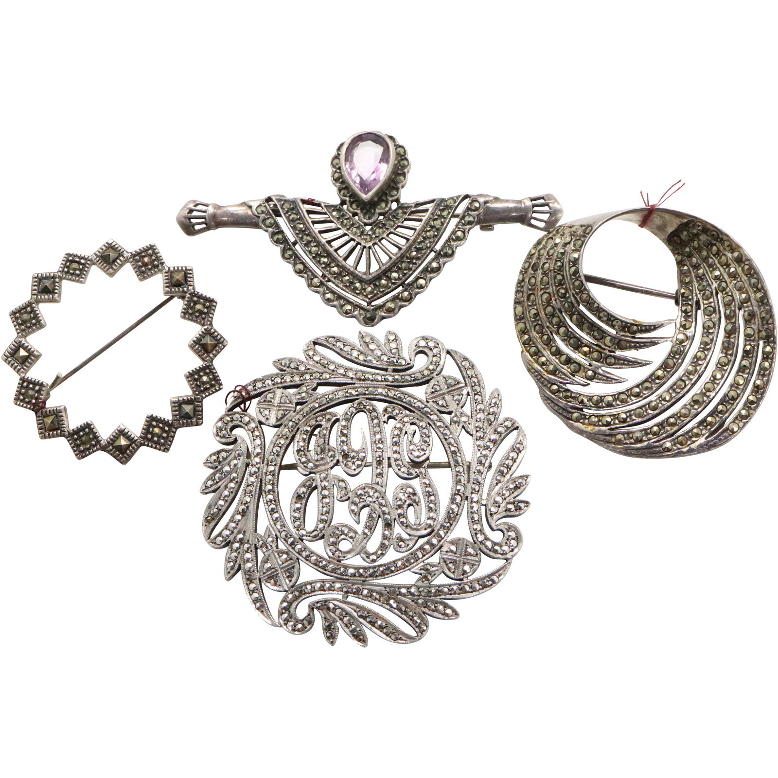 [4] Assorted Sterling & Marcasites Fancy Brooches: [4] Assorted Sterling & Marcasites Fancy Brooches. Marked .925 and Sterling. Size: 1 3/8 in. x 1 3/4 in; 1 1/2 in. diameter; 2 3/8 in. x 1 1/4 in. ; 2 in. diameter.