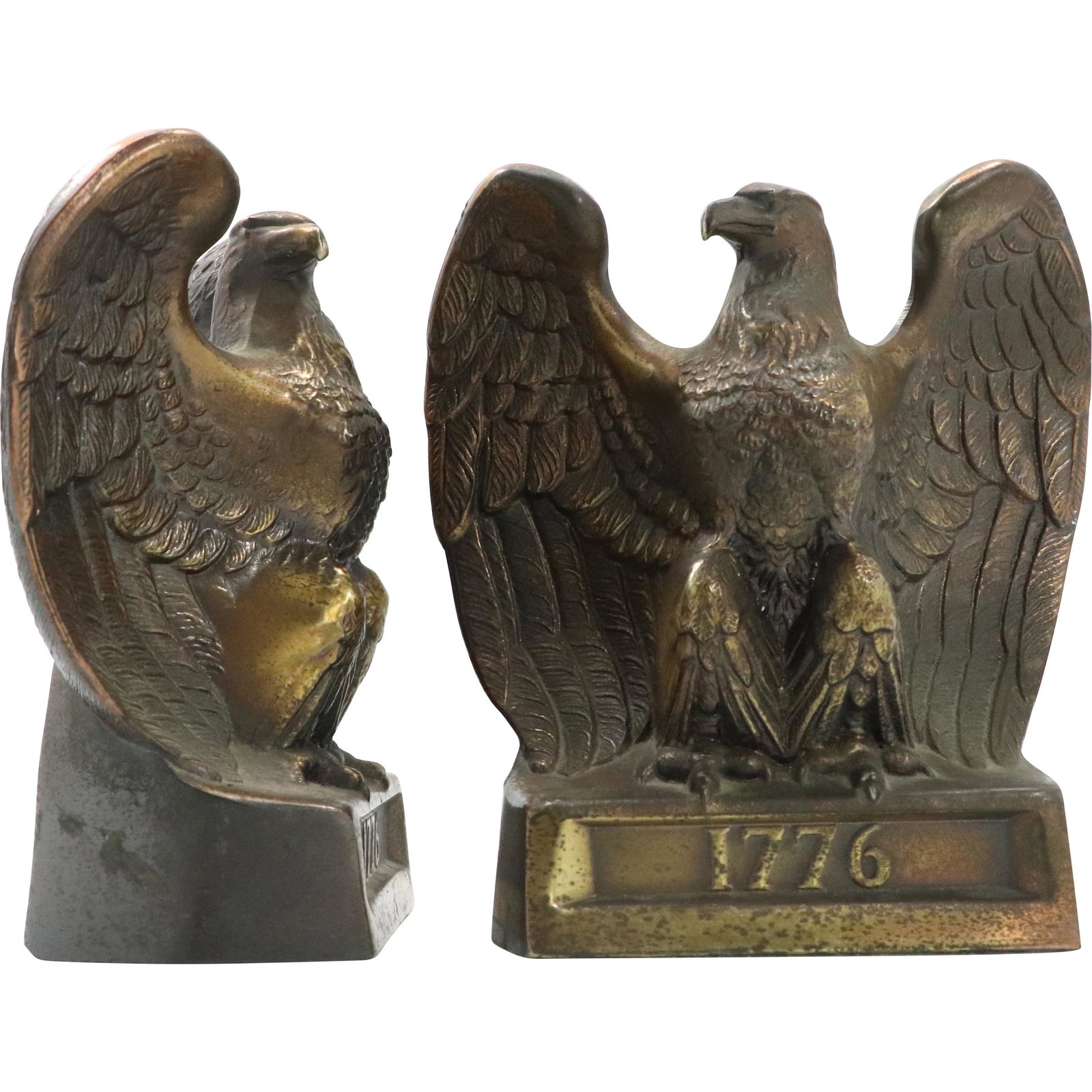 American Eagles 1776 Bookends in Cast Metal Vintage: American Eagles 1776 Bookends in Cast Metal Vintage. Original patina finish. Size: 6.5h x 6w