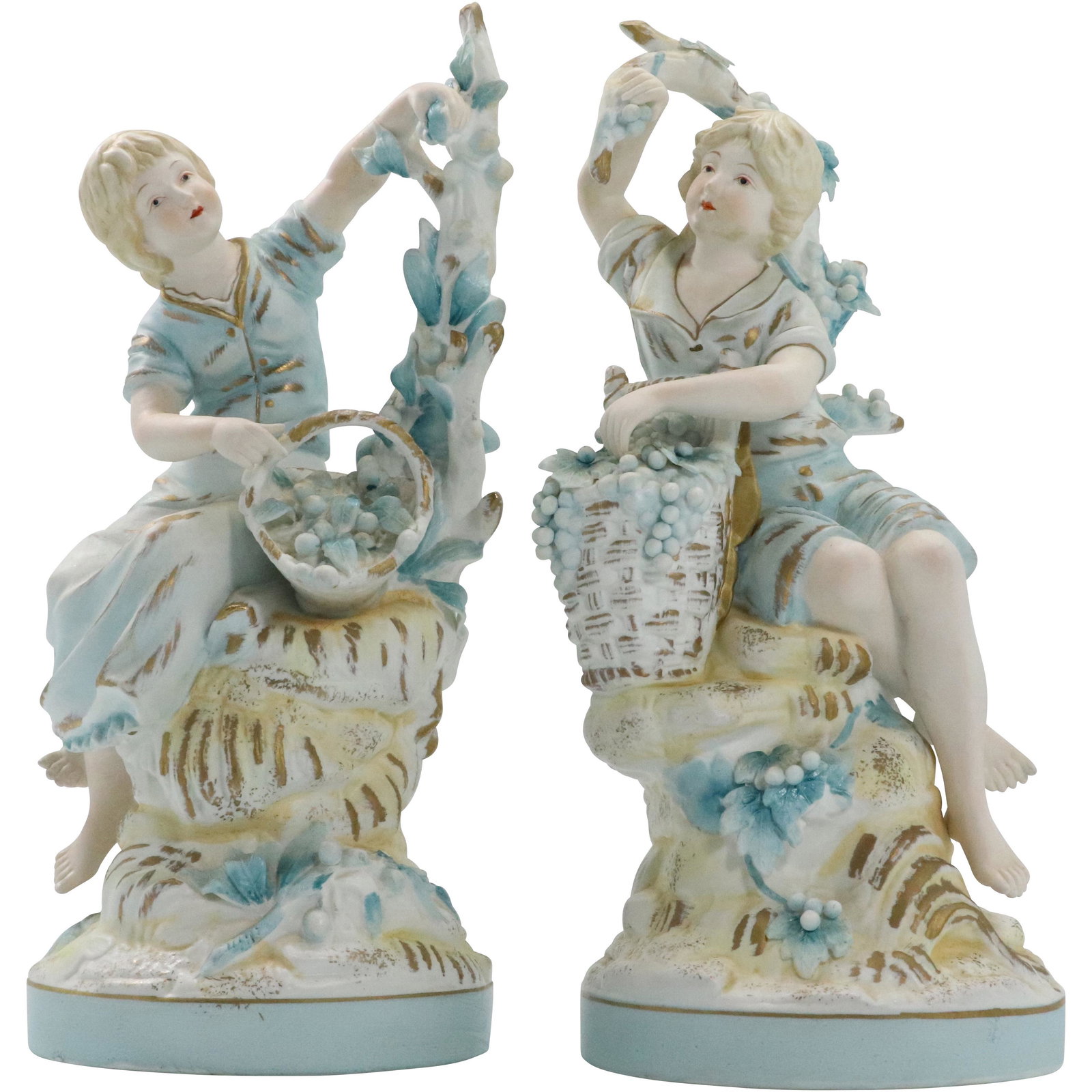 [2] French Bisque Porcelain Boy and Girl Statues: [2] French Bisque Porcelain Boy and Girl Statues Picking Grapes. Size: 12h x 5.25w